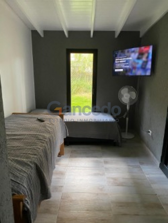 MODERNA CASA CON PILETA BARRIO ALAMOS PINAMAR